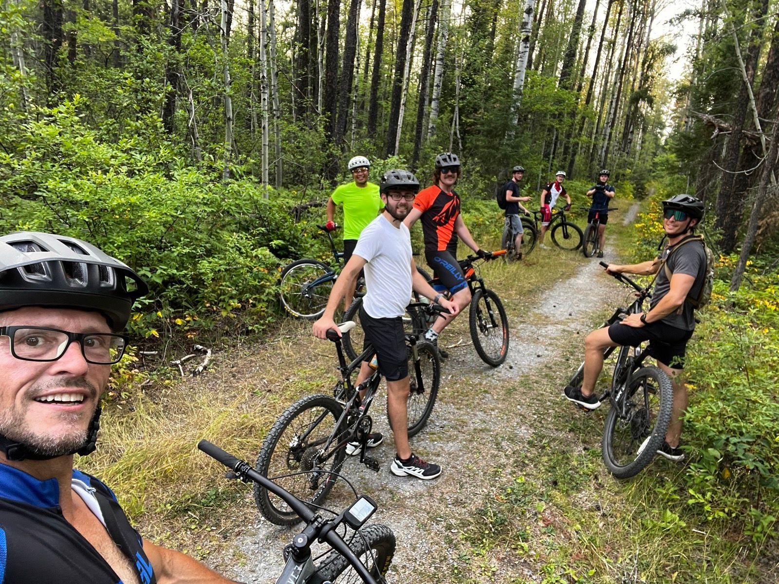 Mountain bikers on a trail.